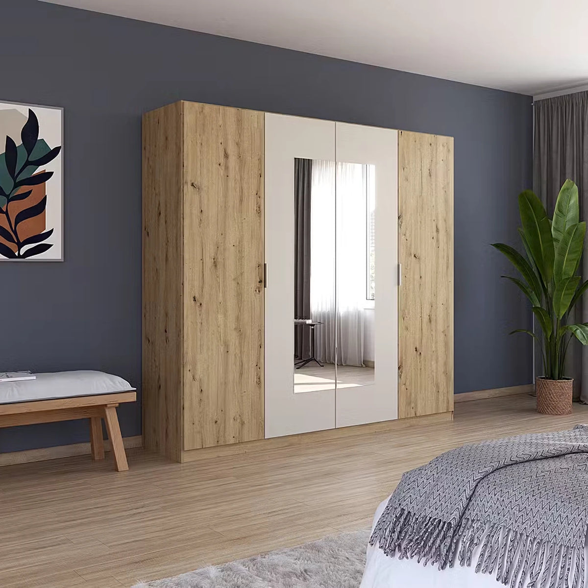 Rauch Monza 4 Door Hinged Door Wardrobe in Artisan Oak & Champagne with mirror styled in a modern bedroom