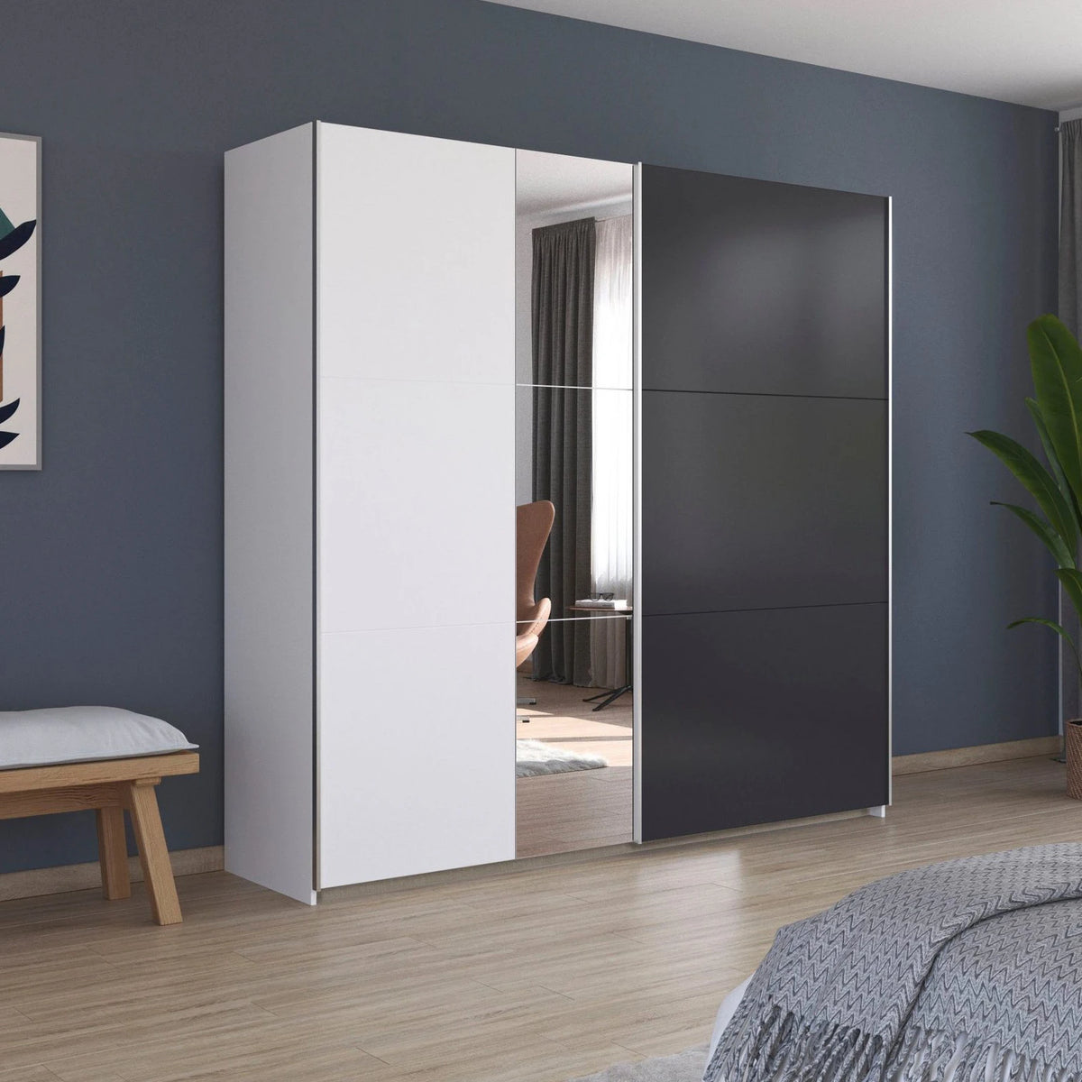 Rauch Monza 2 door sliding wardrobe in Alpine White and Metallic Grey styled in a modern bedroom