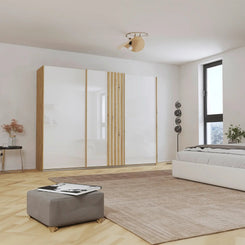 Rauch Mosbach White Glass Large 3 Door Sliding Wardrobe -W271cm - Styled in a Bedroom