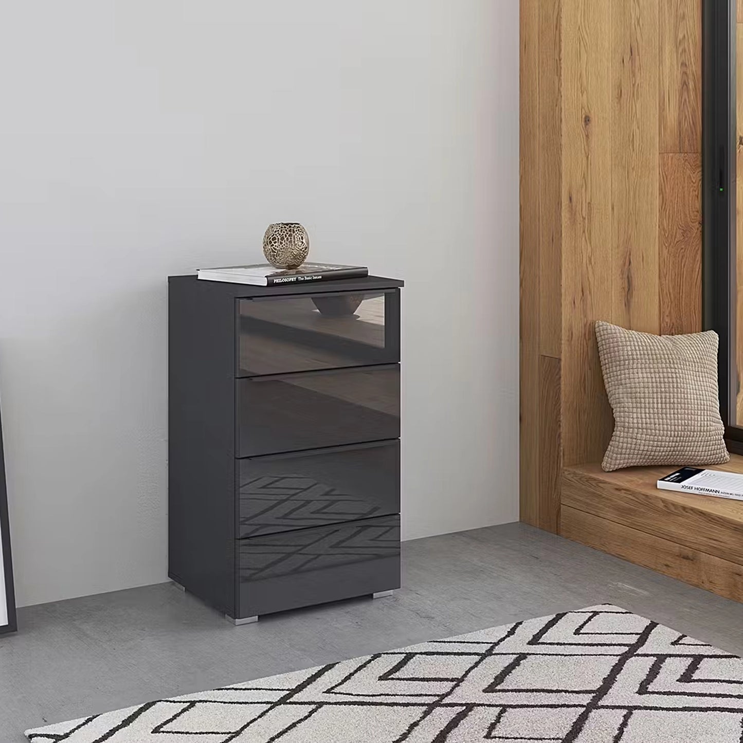 Rauch Novus 4 Drawer Narrow Chest With Glass in Graphite - Styled in a Bedroom