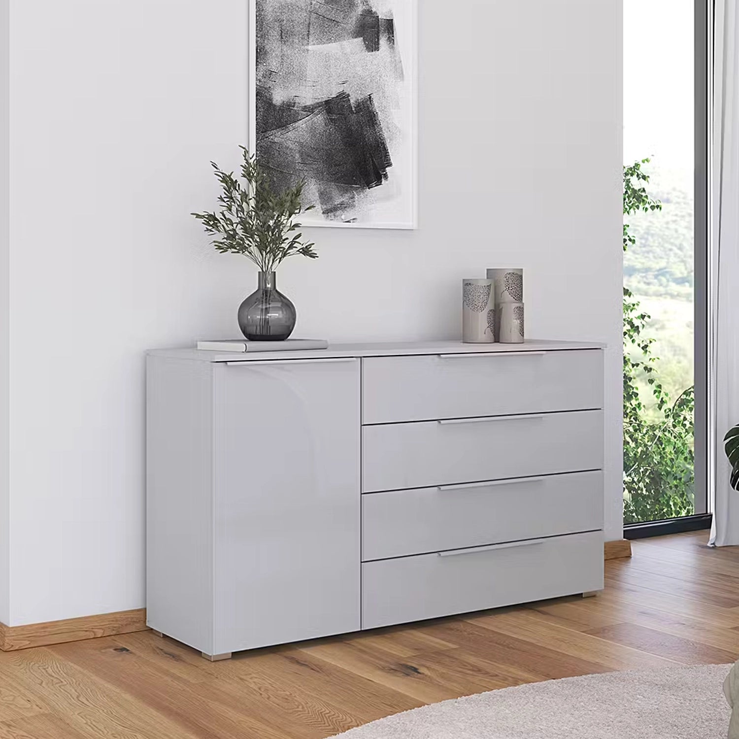 Rauch Novus Large 1 Door 4 Drawer Chest With Glass in Silk Grey - W140cm - Styled in a Bedroom
