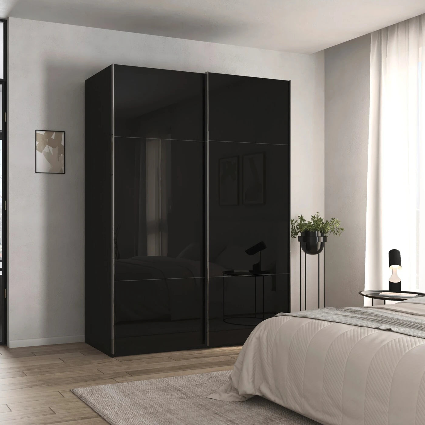 Rauch Orange Plus Contido black Glass sliding wardrobe With  door showing the shorter top and bottom panels either side of the tall centre panel Chrome Handles