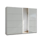 Modern wardrobe with glass doors on a white background