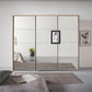 Rauch Prism Artisan Oak 3 Door Full Mirror Sliding Wardrobe - 271cm - Styled in a Bedroom
