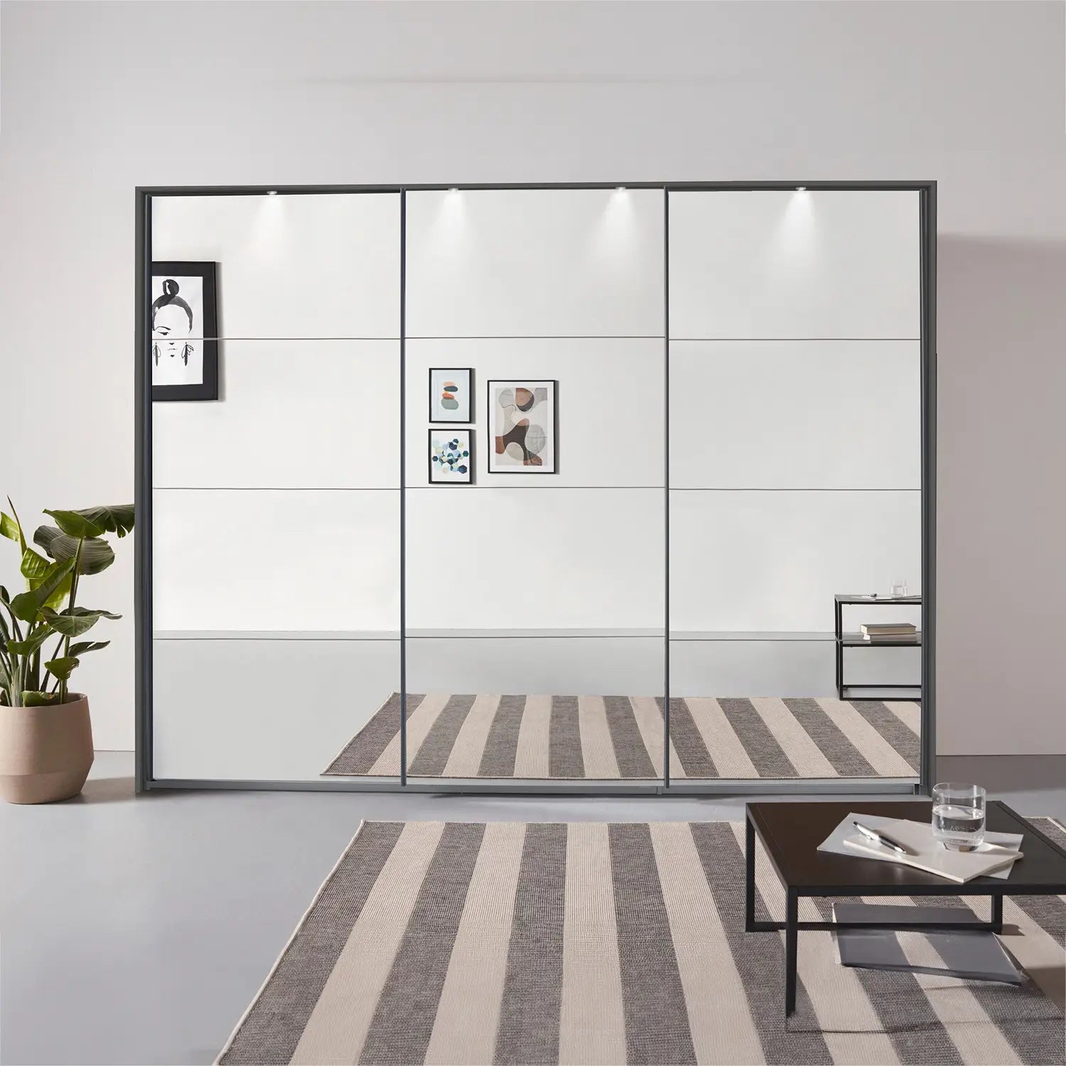 Rauch Prism Metallic Grey 3 Door Full Mirror Sliding Wardrobe - 271cm - Passepartout Frame with Light - Styled in a Bedroom