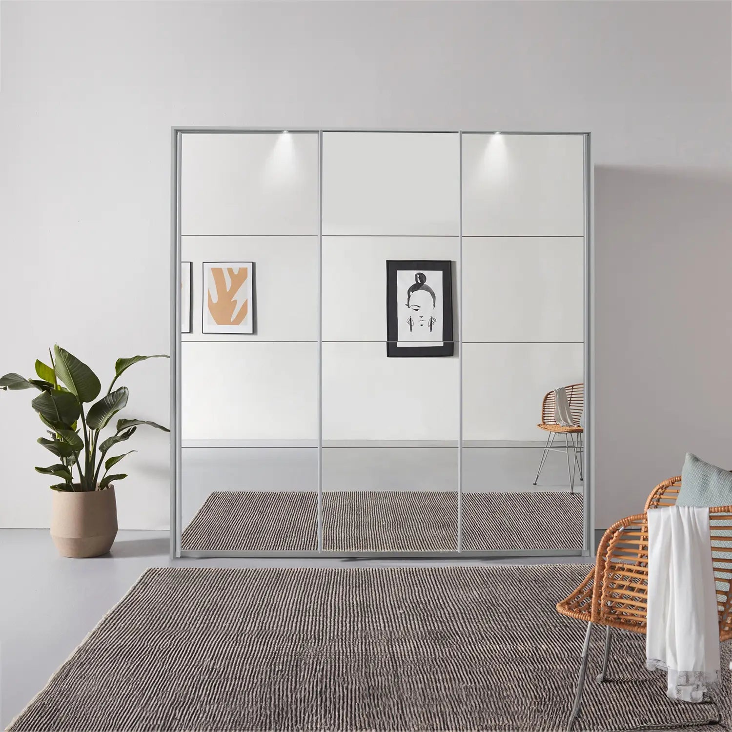 Rauch Prism Silk Grey 3 Door Full Mirror Sliding Wardrobe - 203cm - Passepartout Frame with Light - Styled in a Bedroom