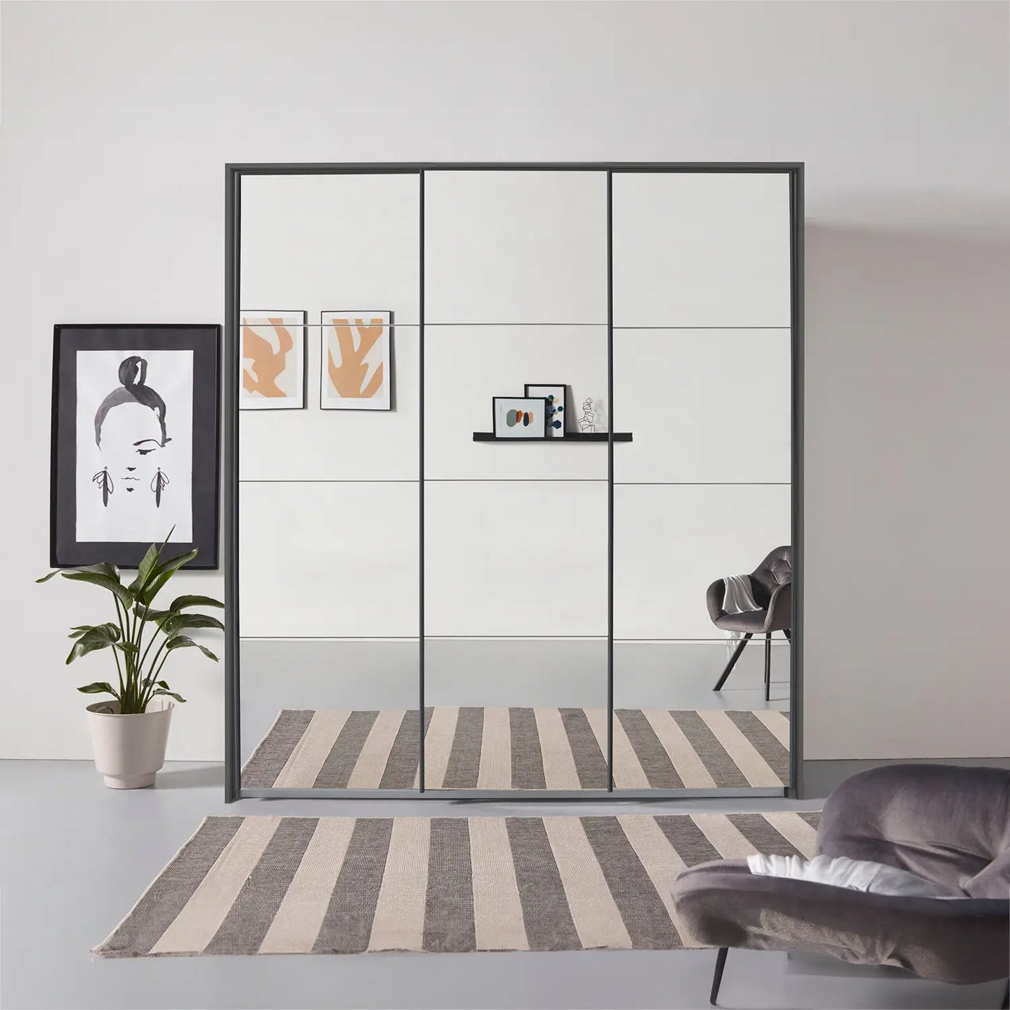 Rauch Prism Graphite 3 Door Full Mirror Sliding Wardrobe - 203cm - Passepartout Frame Styled in a Bedroom
