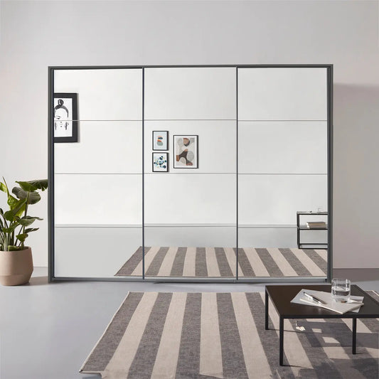 Rauch Prism Metallic Grey 3 Door Full Mirror Sliding Wardrobe - 271cm - Styled in a Bedroom