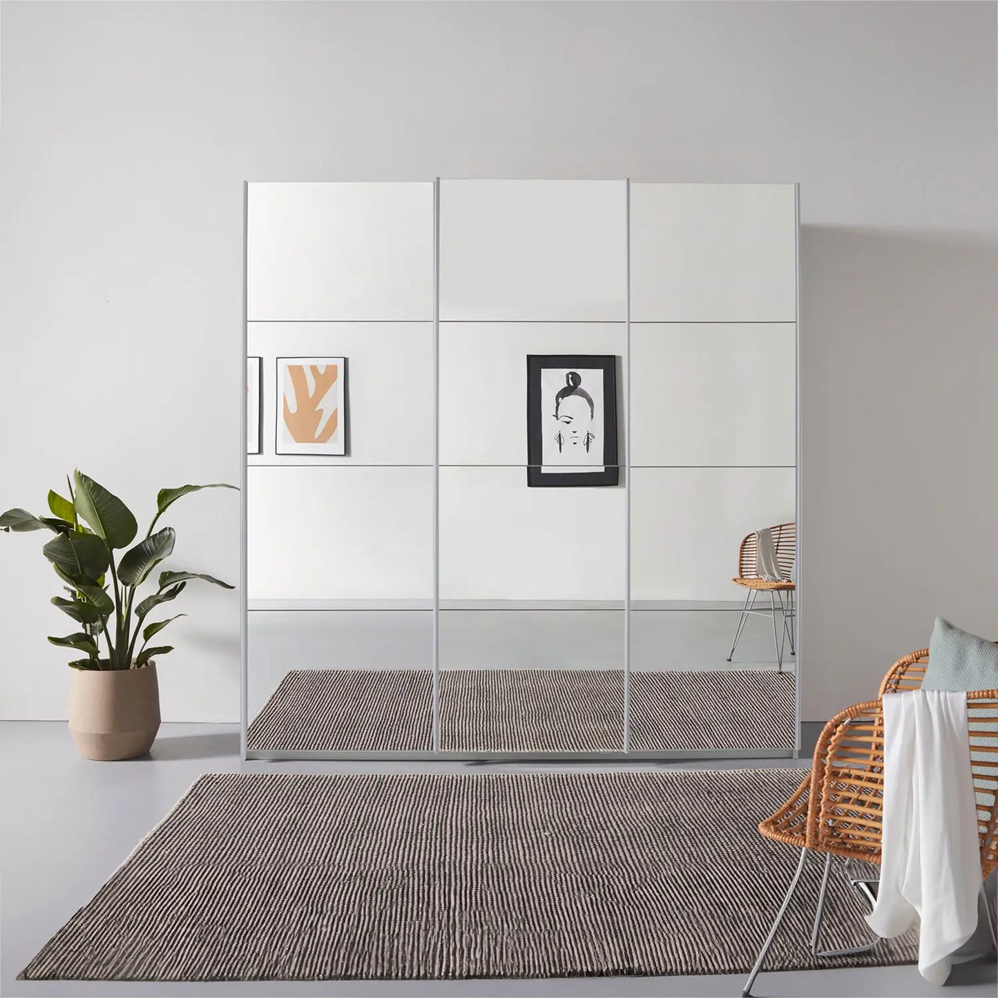 Rauch Prism Silk Grey 3 Door Full Mirror Sliding Wardrobe - 203cm  Styled in a Bedroom