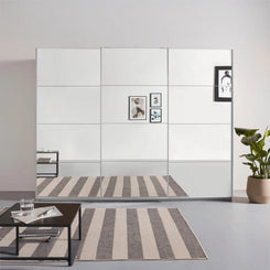 Rauch Prism Silk Grey 3 Door Full Mirror Sliding Wardrobe - 271cm - Styled in a Bedroom