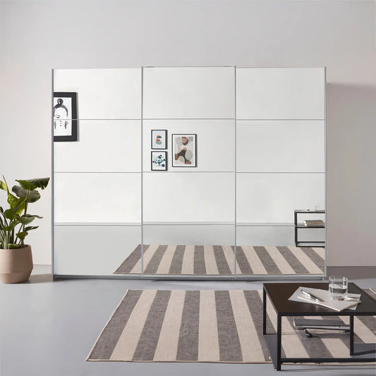 Rauch Prism Silk Grey 3 Door Full Mirror Sliding Wardrobe - 271cm - Styled in a Bedroom