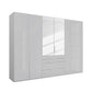 Angled View on White Background of A modern Rauch Frans 301cm Silk Grey Glass 6 Door Hinged Wardrobe with Exterior Drawers, Mirror, Long Door handles and Premium Interior Inside 