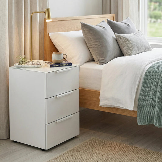 Rauch Heaven 3 Drawer Bedside Cabinet with Glass Top and Front - Styled in a Bedroom