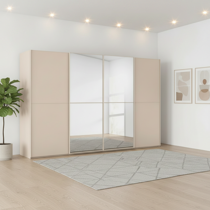 A modern Rauch Supreme Duo Champagne Sliding 4 Door Wardrobe with Mirror