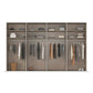 Clothing wardrobe with clothes displayed on hangers.