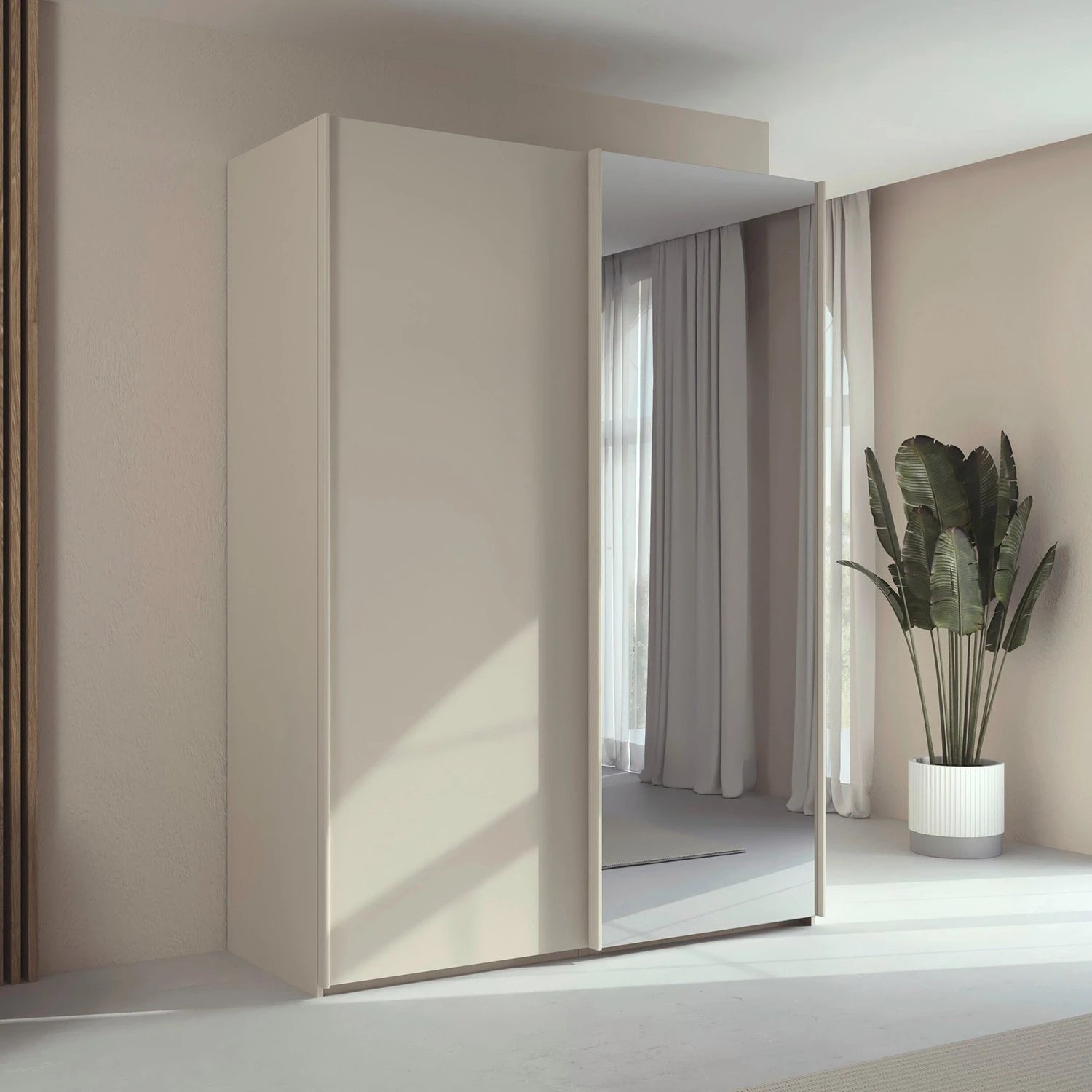 Rauch Taro 2 Door 1 Mirror Door Sliding Wardrobe in Champagne finish styled in a modern bedroom