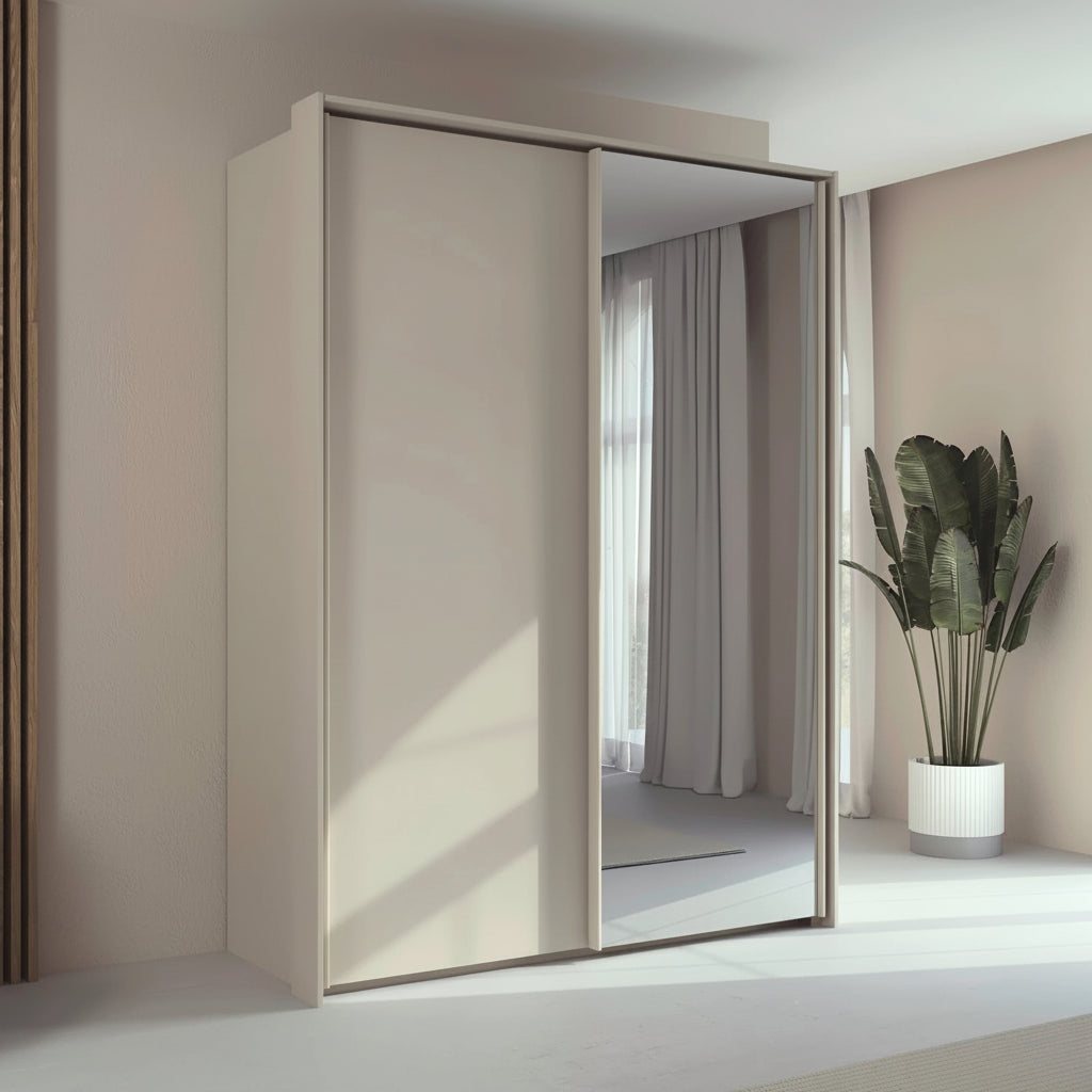 Rauch Taro 2 Door 1 Mirror Door Sliding Wardrobe in Champagne finish with passepartout frame styled in a modern bedroom