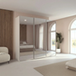 Rauch Taro 3 Door Full Mirror Sliding Wardrobe with Champagne Carcase in modern bedroom