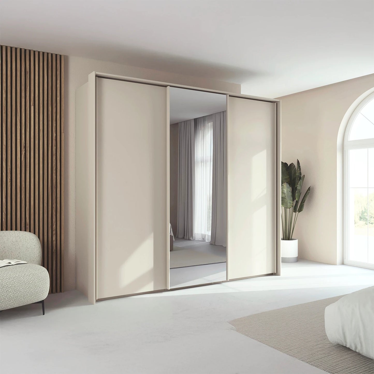 Rauch Tara 3 Door Sliding Wardrobe in Champagne with central mirror door with passepartout frame styled in a modern bedroom
