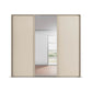 Rauch Tara 3 Door Sliding Wardrobe in Champagne with central mirror door with passepartout frame - front view