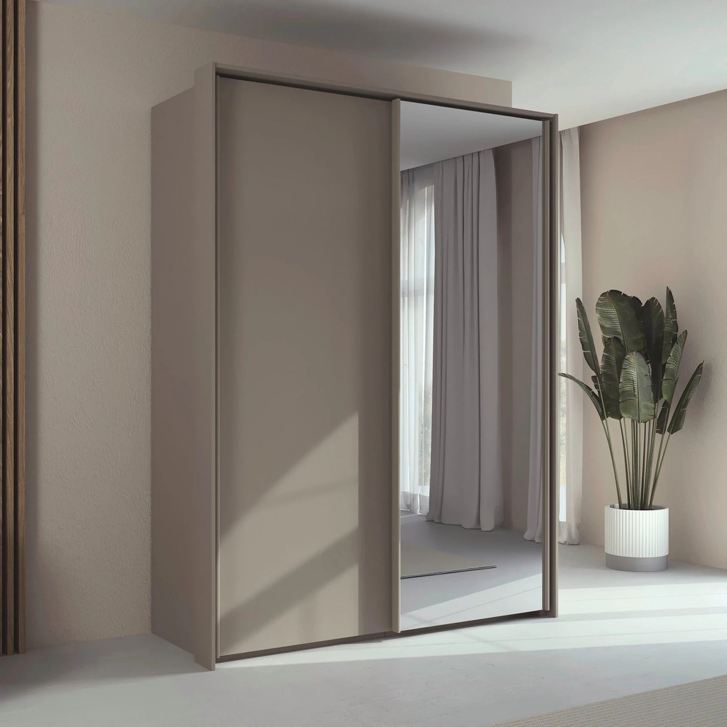Rauch Taro 2 Door 1 Mirror Door Sliding Wardrobe in Fango finish with passepartout frame styled in a modern bedroom