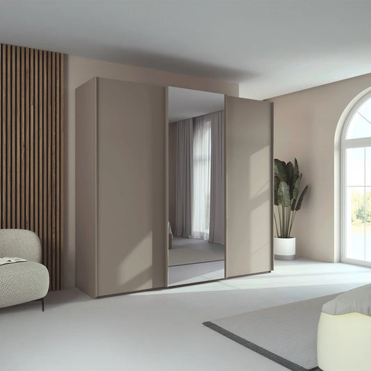 Rauch Tara 3 Door Sliding Wardrobe in Fango with central mirror door styled in a modern bedroom