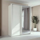 Rauch Taro 2 Door 1 Mirror Door Sliding Wardrobe in Alpine White finish styled in a modern bedroom