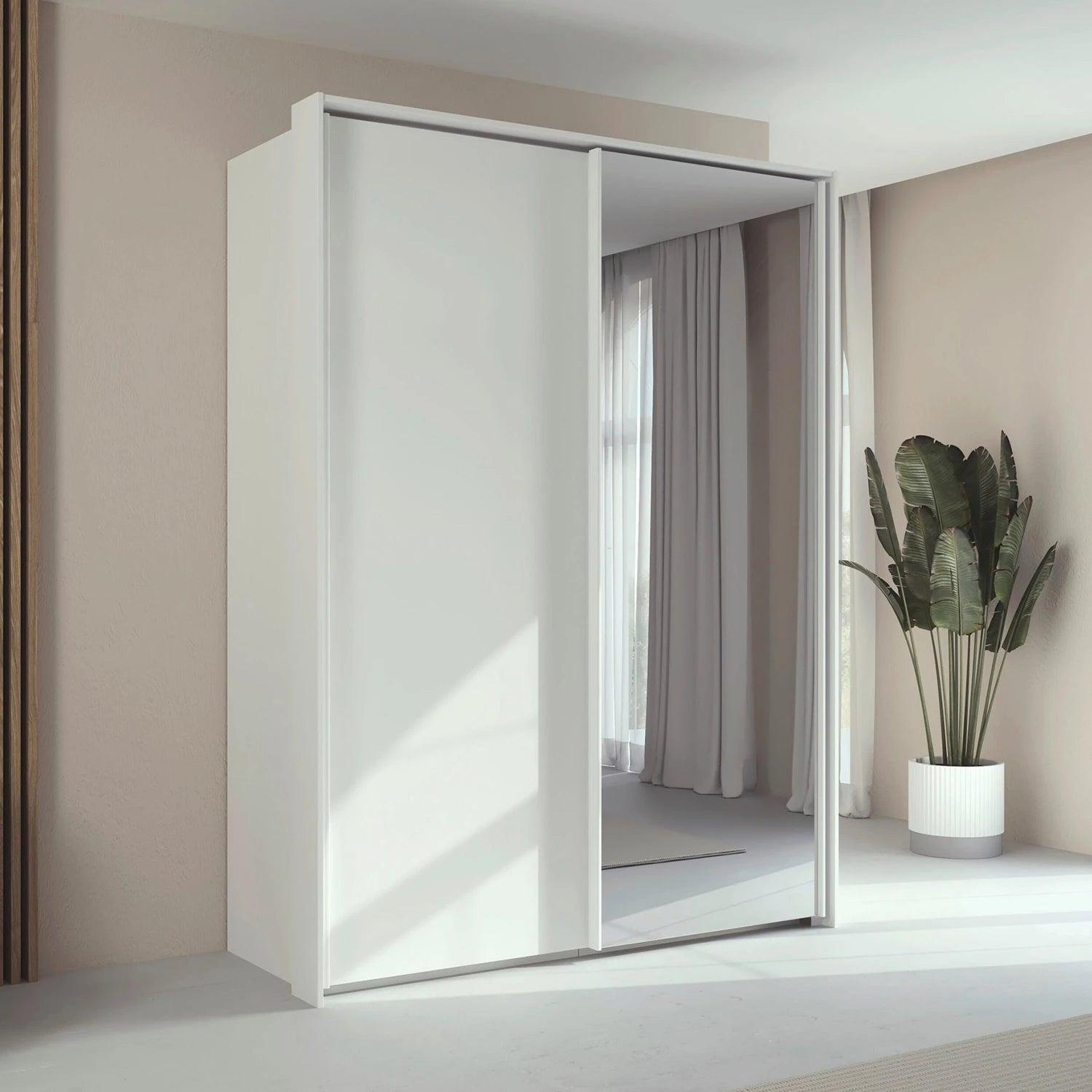 Rauch Taro 2 Door 1 Mirror Door Sliding Wardrobe in Alpine White finish styled in a modern bedroom