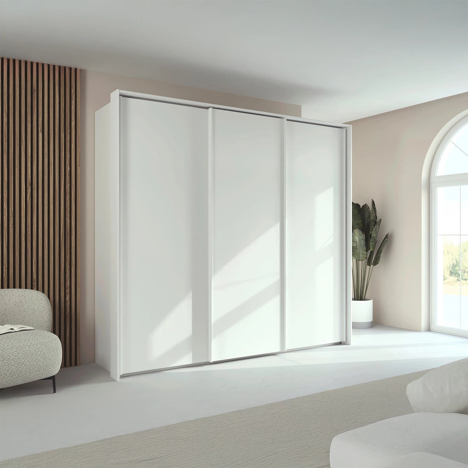 Rauch Taro 3 Door Sliding Wardrobe in Alpine White Styled in a modern bedroom
