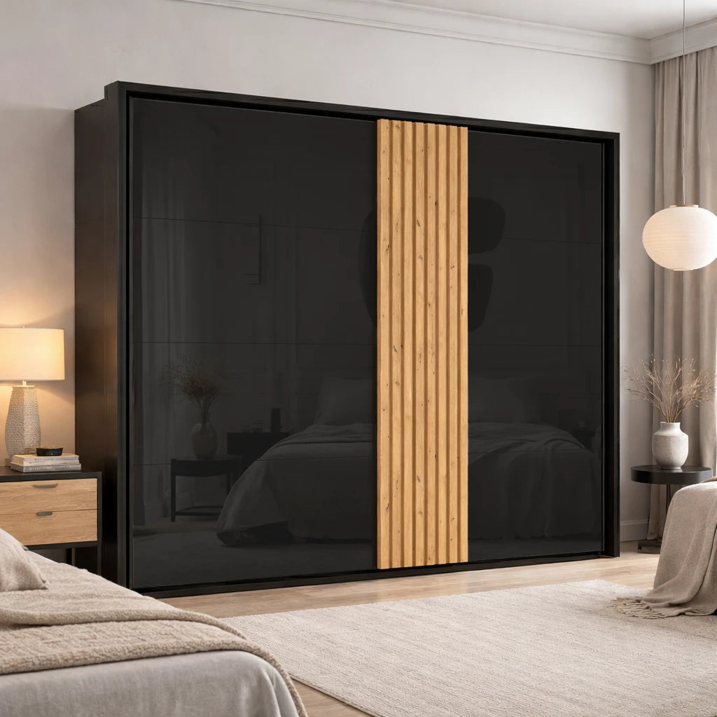 Modern bedroom with a black sliding wardrobe door featuring wooden slats.