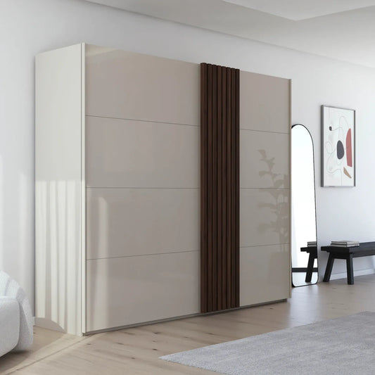 Rauch Tegra Fusion Champagne Glass and Walnut Oak Sliding Door Wardrobe - Styled in a Bedroom