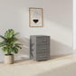 Rauch Impulse 3 Drawer Bedside Table in Metallic Grey styled in a modern room