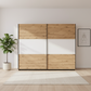 Rauch Neo 2 Door Sliding Wardrobe 261cm in Artisan Oak with White Panels  Front view styled in a modern room