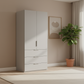 Rauch Heaven 100cm 2 Door Combi Wardrobe with Decor Doors and Drawers in Silk Grey styled in a modern bedroom