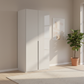 Rauch Heaven 101cm 2 Door Hinged Wardrobe with Glass Doors in Silk Grey styled in a modern bedroom