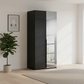 Rauch Heaven 101cm 2 Door Hinged Wardrobe with 1 Glass Door and 1 Mirror Door in Black styled in a modern room