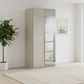 Rauch Heaven 101cm 2 Door Hinged Wardrobe with 1 Glass Door and 1 Mirror Door in Fango styled in a odern room