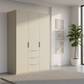 Rauch Heaven 150cm 3 Door Combi Wardrobe with Décor Doors in Champagne styled in a modern bedroom