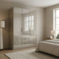 Rauch Haven  3 Door Combi Wardrobe with Glass Doors in Fango - Styled in a Bedroom