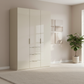 Rauch Heaven 150cm 3 Door Combi Wardrobe with Glass Doors in Champagne styled in a modern bedroom