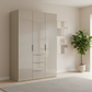 Rauch Heaven 150cm 3 Door Combi Wardrobe with Glass Doors in Fango styled in a modern bedroom
