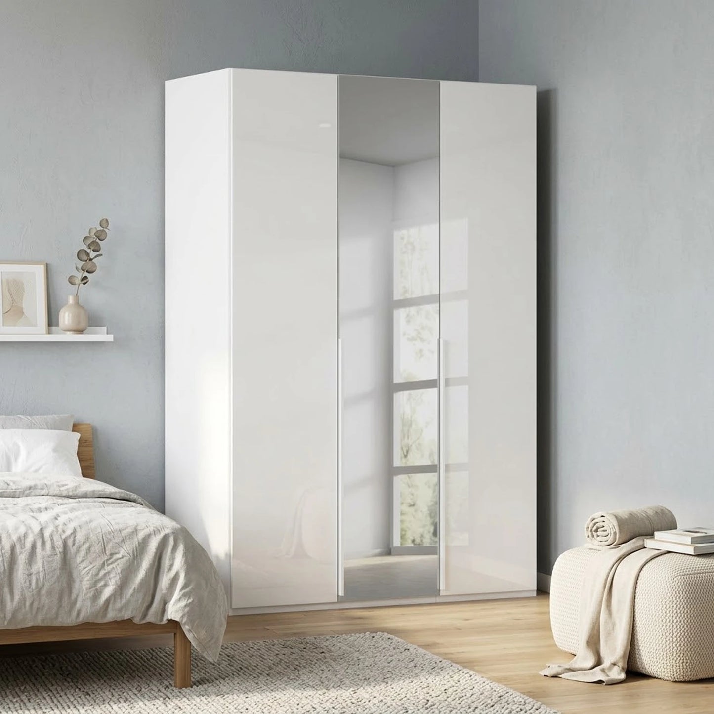Rauch Haven 3 Door Hinged Wardrobe with 2 Glass Doors and 1 Mirror Door - Styled in a Bedroom