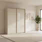 Rauch Heaven 180cm 2 Door Slider Wardrobe with Glass Doors in Champagne styled in a modern bedroom