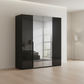 Rauch Heaven 200cm 4 Door Hinged Wardrobe with 2 Glass Doors and 2 Mirror Doors in Black styled in a modern bedroom