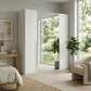 Rauch Haven 4 Door Hinged Wardrobe with 2 Décor Doors and 2 Mirror Doors - Styled in a Bedroom