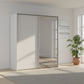 Rauch Heaven 200cm 2 Door Slider Wardrobe with 1 Décor Door and 1 Mirror Door in Silk Grey styled in a modern bedroom