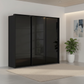 Rauch Heaven 240cm 3 Door Slider Wardrobe with Glass Doors in Black styled in a modern bedroom