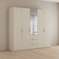 Rauch Heaven 250cm 5 Door Combi Décor Wardrobe with 4 Décor Doors and 1 Mirror Door in Champagne styled in a modern bedroom