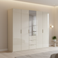 Rauch Heaven 250cm 5 Door Combi Wardrobe with 4 Glass Doors and 1 Mirror Door in Champagne styled in a modern bedroom