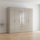 Rauch Heaven 250cm 5 Door Combi Wardrobe with 4 Glass Doors and 1 Mirror Door in Fango styled in a modern bedroom